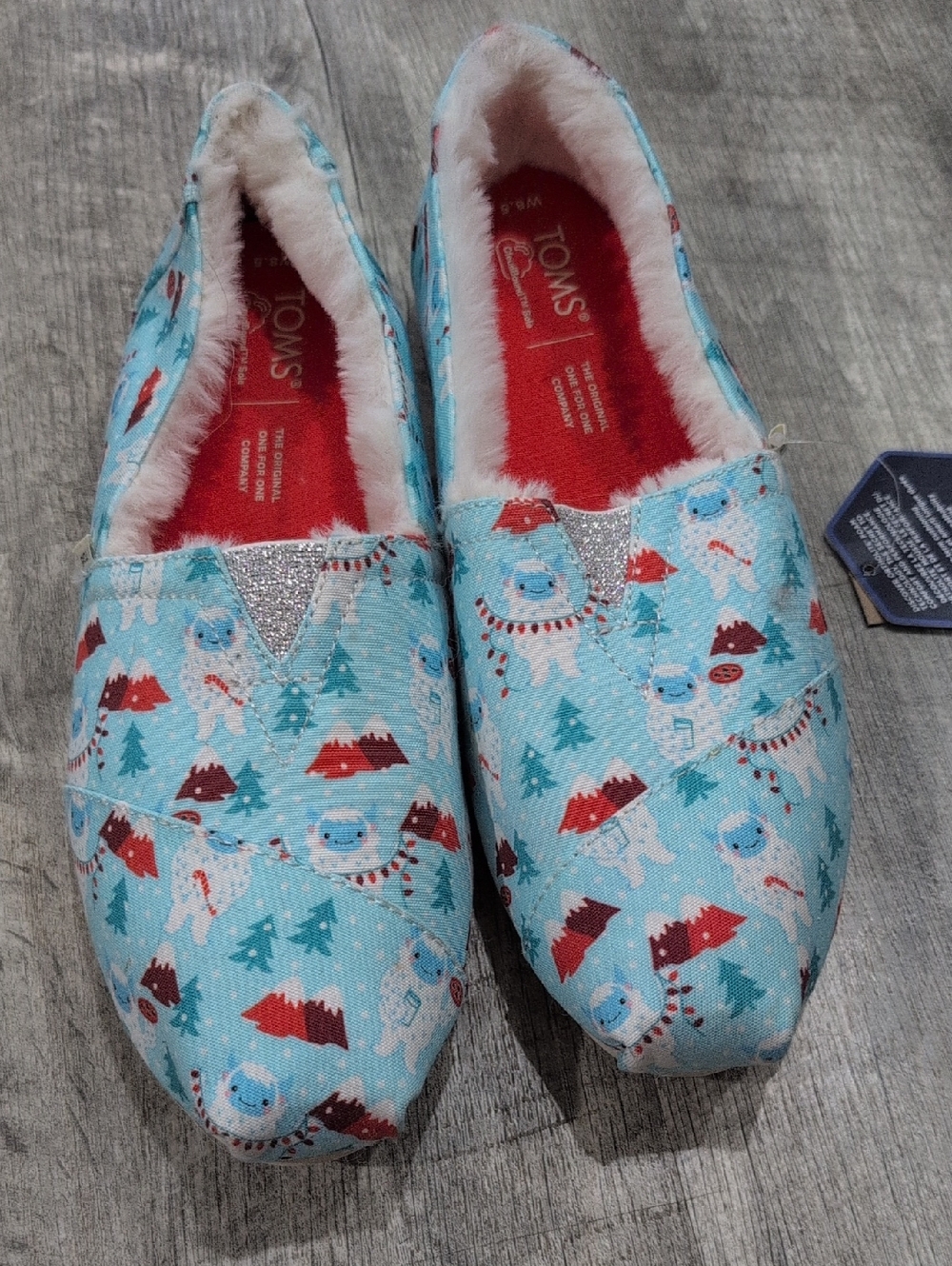 TOMS Women's Light Blue Holiday Yeti Pattern Slip-Ons with Red Accents Size 8.5